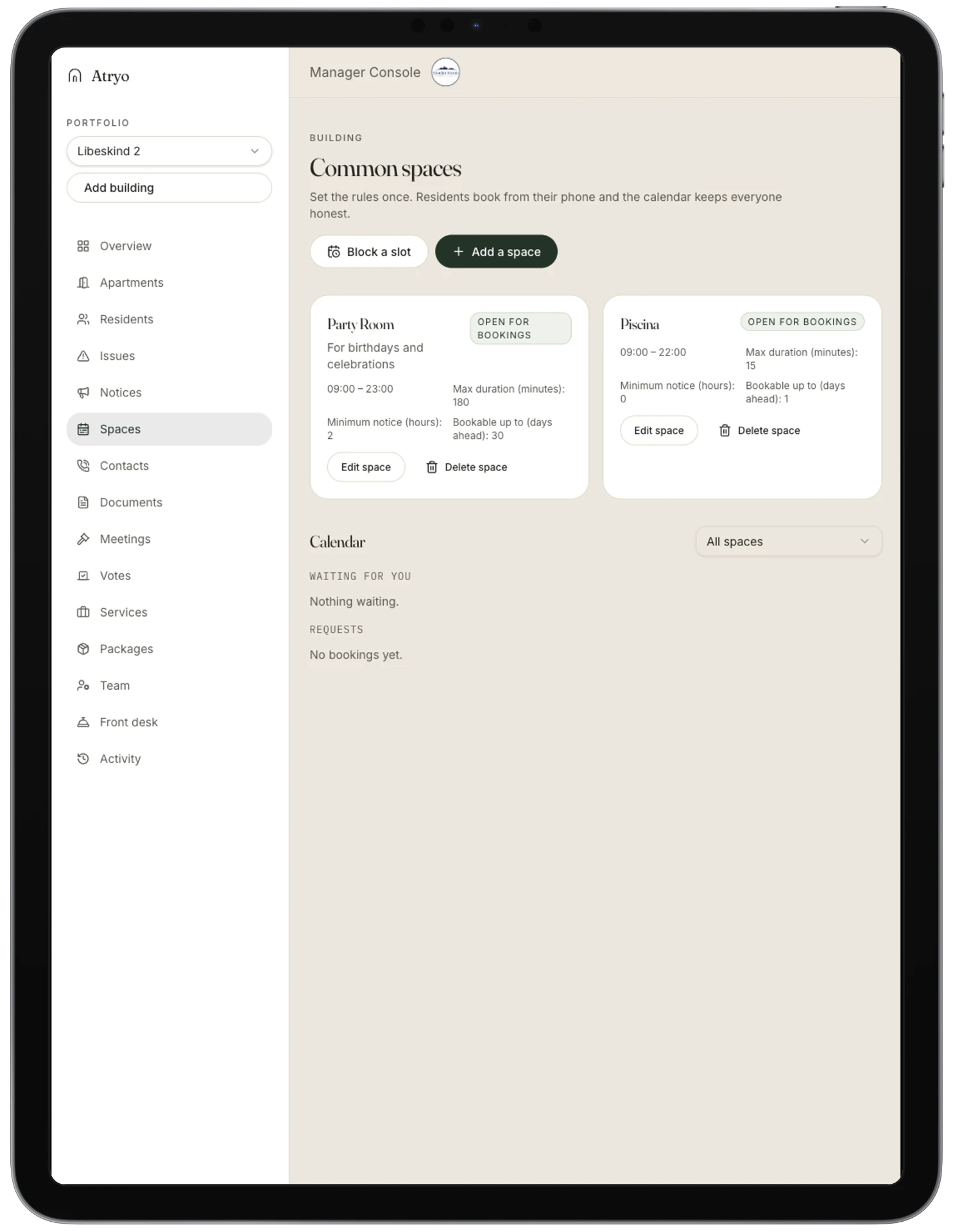 Atryo manager console common spaces page with bookable rooms and a calendar